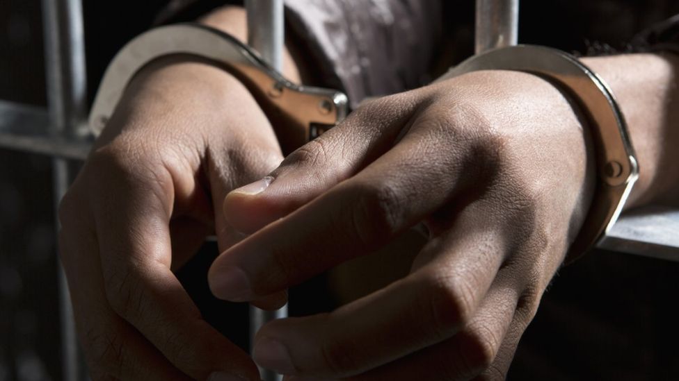 Generic prisoner in handcuffs