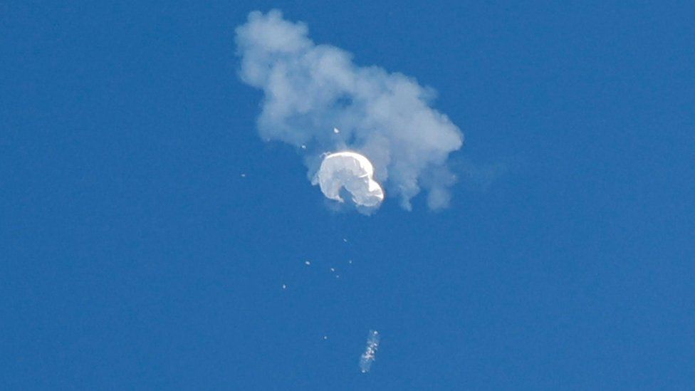 The suspected Chinese spy balloon (surveillance balloon) drifts to the ocean after being shot down off the coast in Surfside Beach, South Carolina, U.S. February 4, 2023.