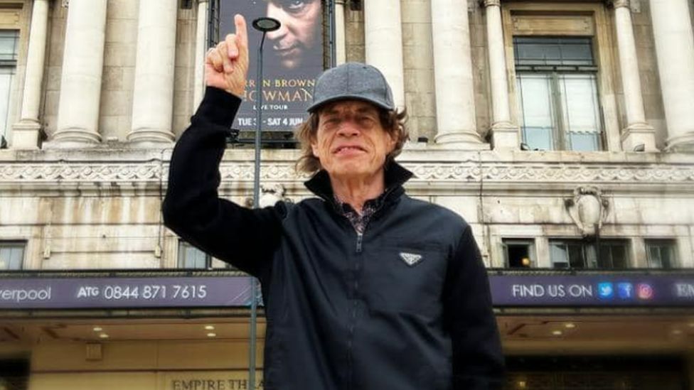 Mick Jagger outside the Empire theatre