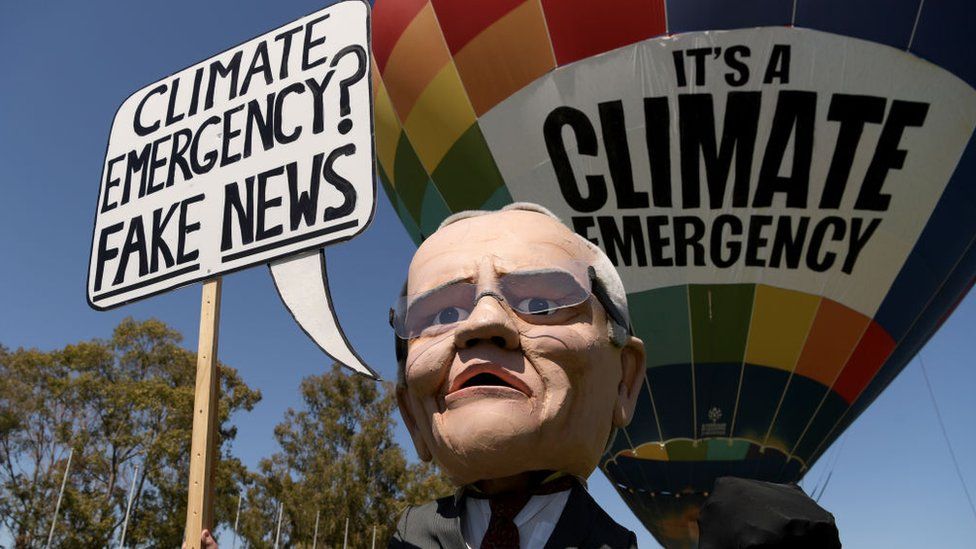 A puppet of Australian PM Scott Morrison suggesting he thinks a climate emergency is "fake news"