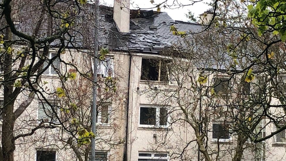 Roof of the flat is shown having partly fallen in