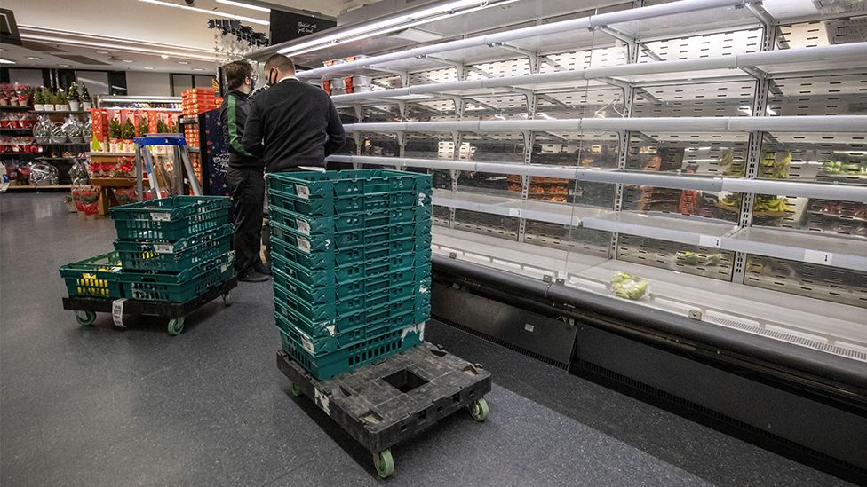Empty food grocery shelves in a M&S supermarket during the build up to Christmas week as the EU borders are closed and trucks unable to deliver goods. December 2020