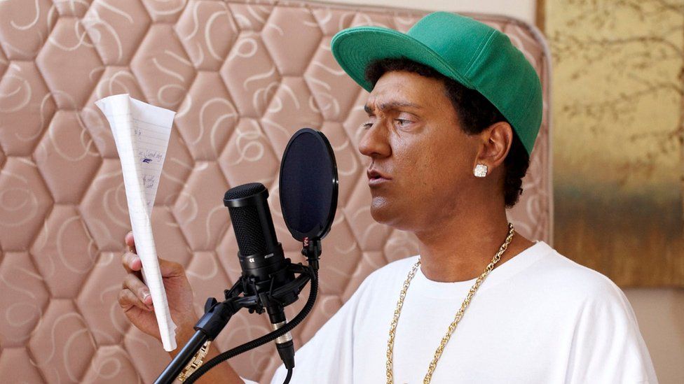 Chris Lilley playing rapper S Mouse