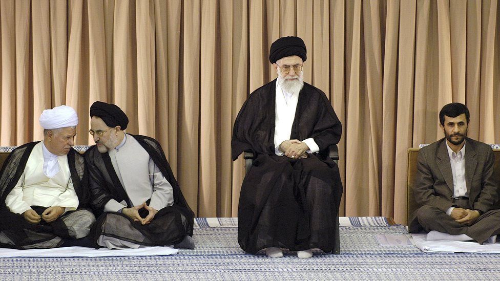 Akbar Hashemi Rafsanjani (L), Mohammad Khatami (2nd L) and Mahmoud Ahmadinejad (R) sit beside Ayatollah Ali Khamenei at a ceremony in Tehran on 8 March 2015