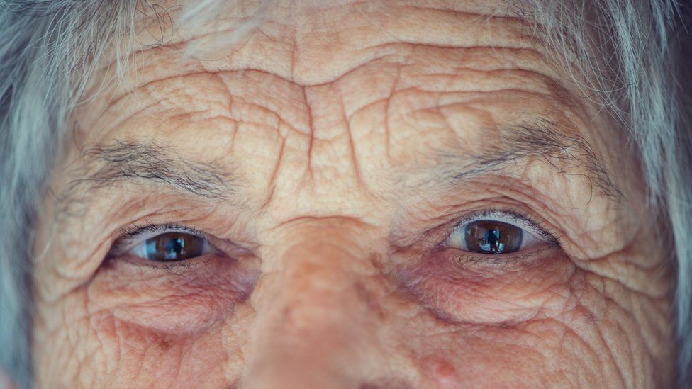 Close-up shot of an elderly woman