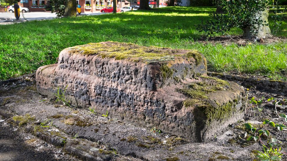 Travellers' rest stone at Stag Inn traffic island