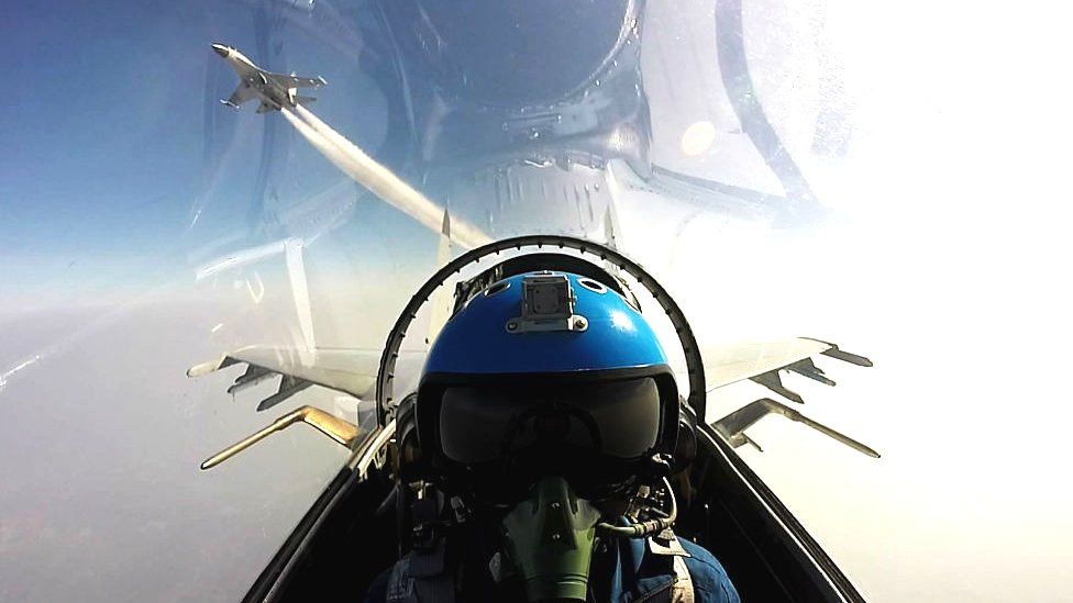 Undated photo of Chinese jet fighters during a military drill in the South China Sea