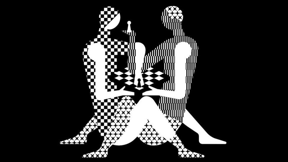 The World Chess Championship logo appears to show two black-and-white figures, shaped like humans, playing a game of chess whilst sitting. Their bodies are touching with their legs intertwined.