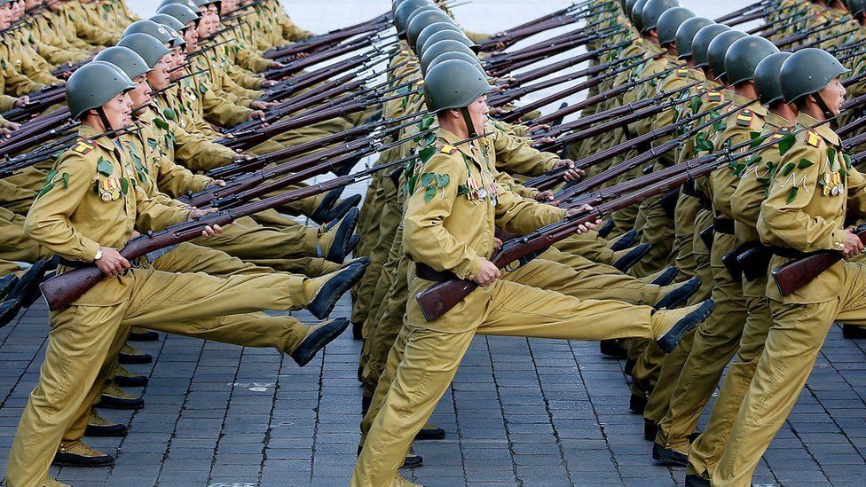 On Saturday, Oct. 10, 2015, North Korean soldiers march across the Kim Il Sung Square during a military parade in Pyongyang, North Korea.