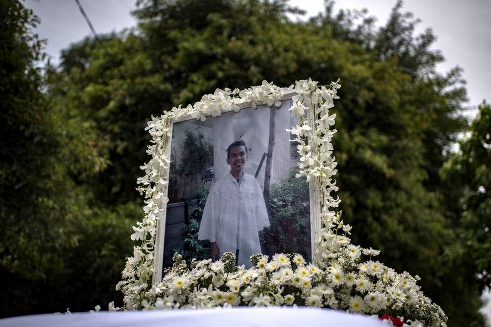 A photo of Kian Delos Santos, 17, on top of the hearse during his funeral in Caloocan city, Philippines, 26 August