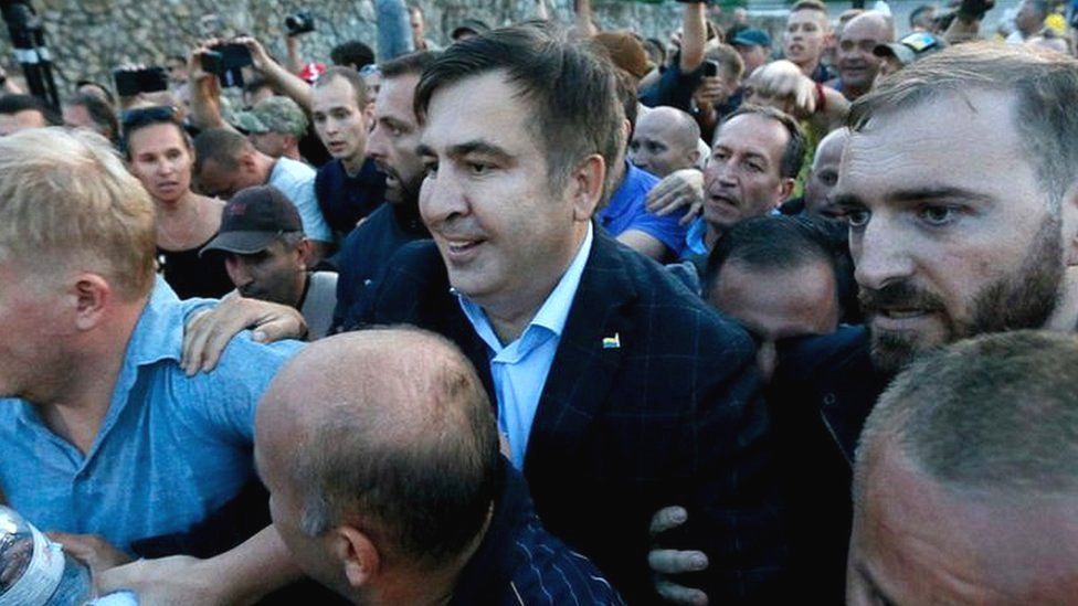 Former Georgian President Mikheil Saakashvili is surrounded by his supporters as he arrives at a checkpoint on the Ukrainian-Polish border in Krakovets, Ukraine September 10, 2017