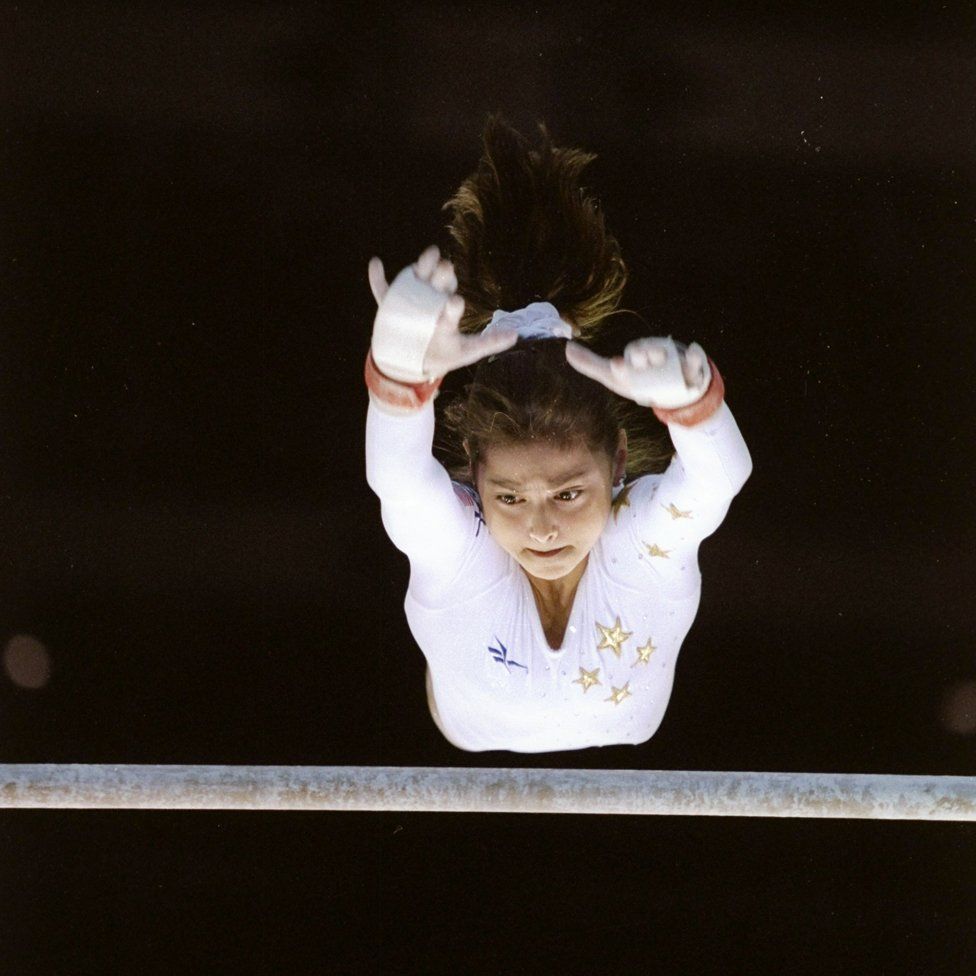 Dominique Moceanu of the United States performs during the Olympic Games at the Georgia Dome in Atlanta