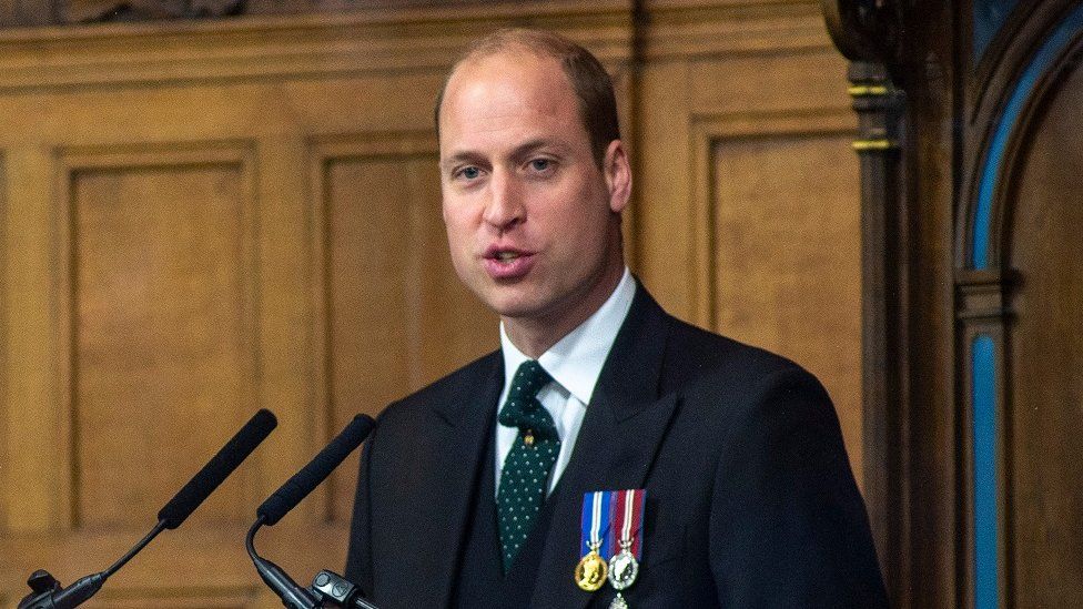 Prince William speaking at a podium at the general assembly of the Church of Scotland