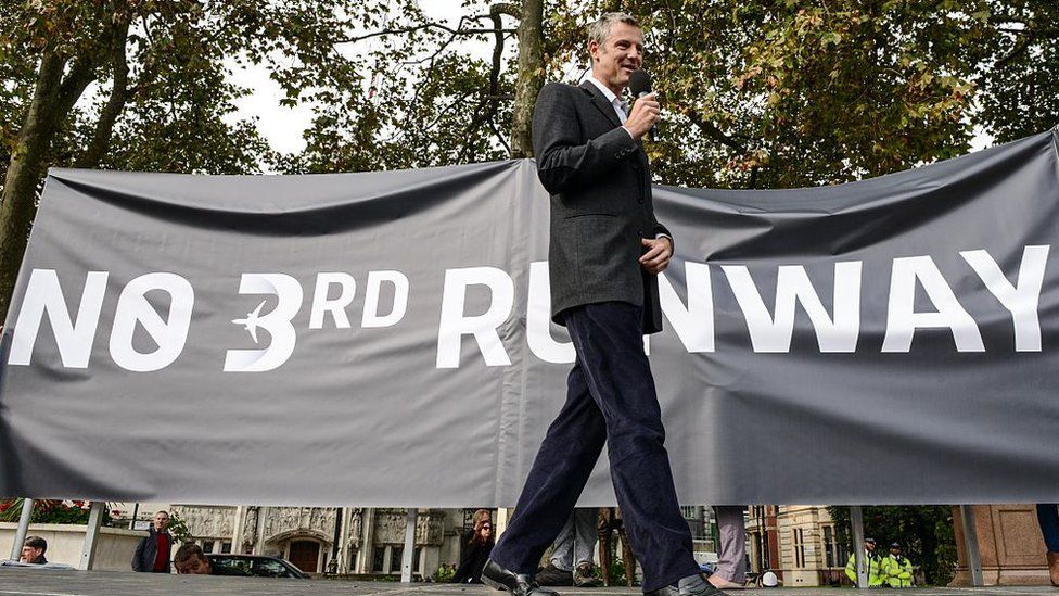 Conservative Mayoral candidate speaks to protesters during a rally against a third runway at Heathrow airport, in Parliament Square on October 10, 2015 in London, England.