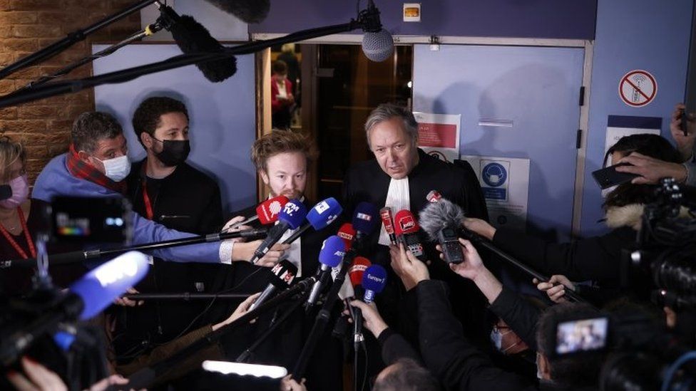 Benzema's lawyers speaking to reporters outside court