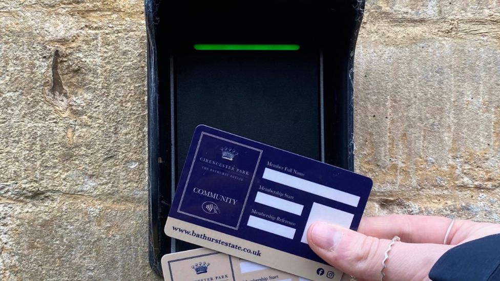 Someone scanning their card to get into Cirencester Park