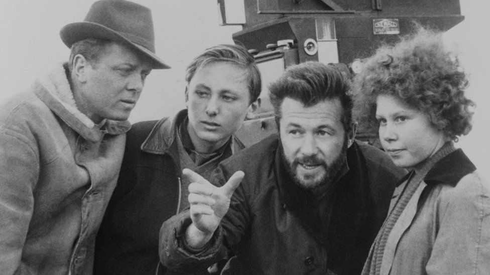 Richard Attenborough (left) and Brian Forbes (centre, pointing) on the set of Whistle Down The Wind