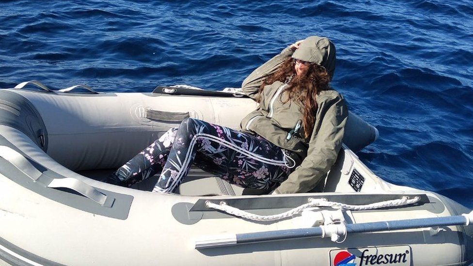 Kushila Stein in her dinghy after being rescued by the Hellenic Coast Guard