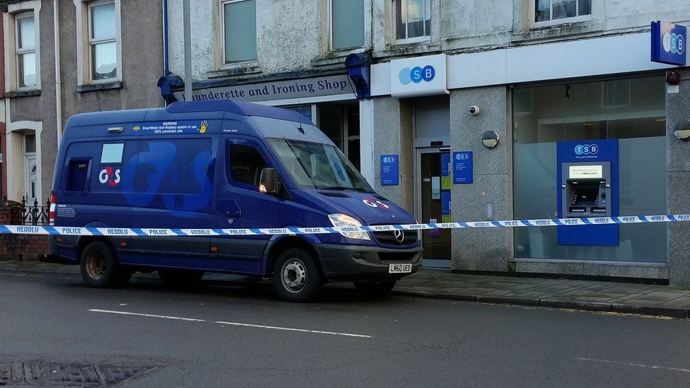 A police cordon is in place on the High Street in Glynneath