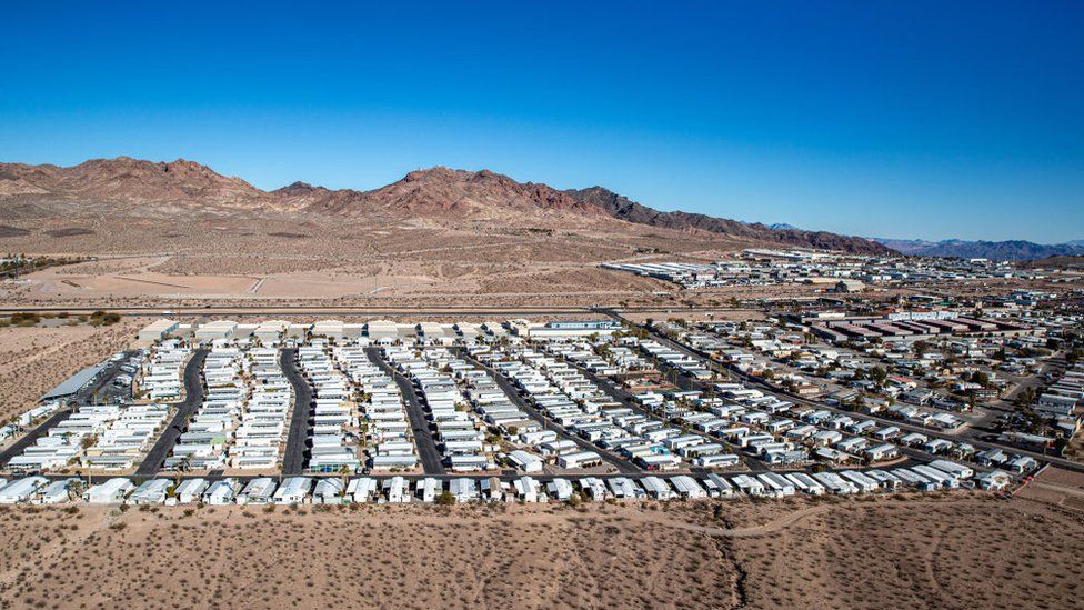 Swaths of the US, like this Nevada trailer park, rely on water brought in from miles away