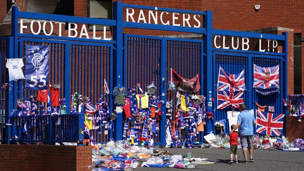 Fans left their own tributes outside the gates at Ibrox