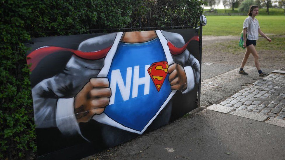 A mural celebrating NHS workers by artist Lionel Stanhope at Hilly Fields, South London