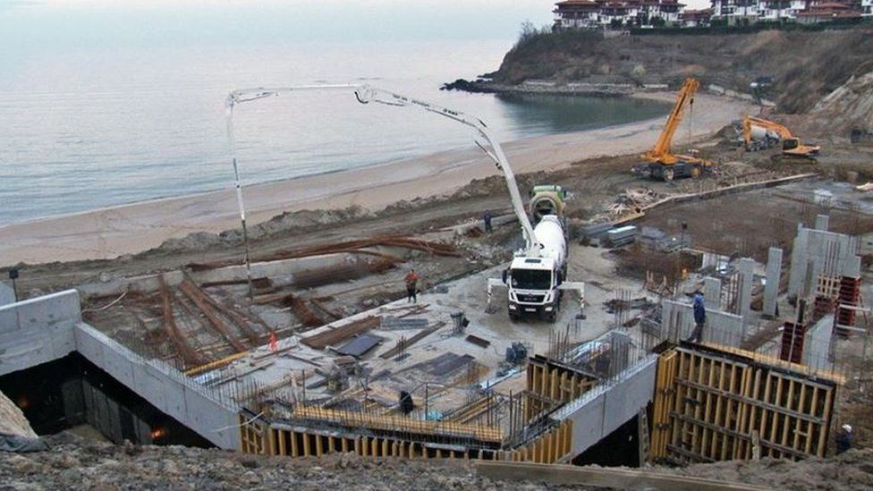 Construction site right next to a beach