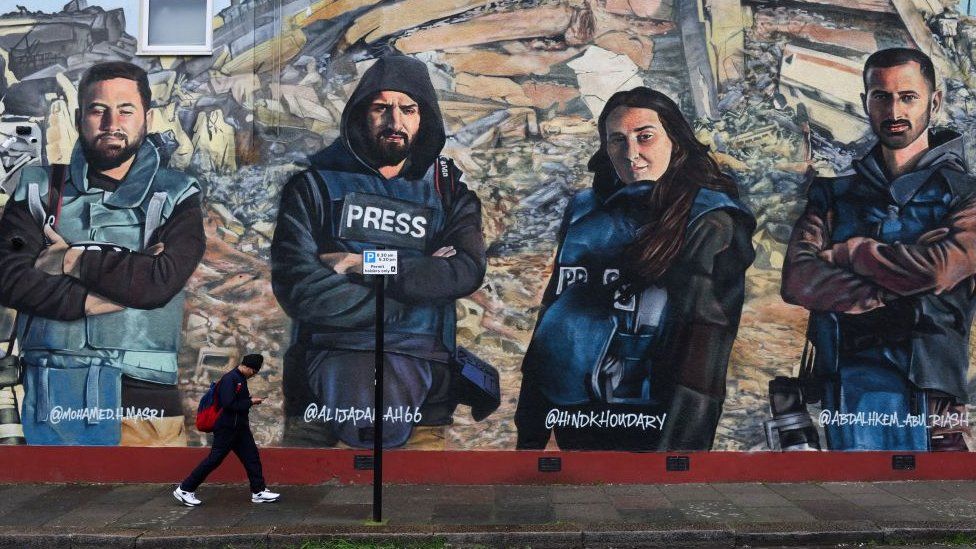 The mural of journalists Mohamed Al Masri, Ali Jadallah, Hind Khoudary and Abdulhakim Abu Riash inspired by a photo by Suhail Nassar