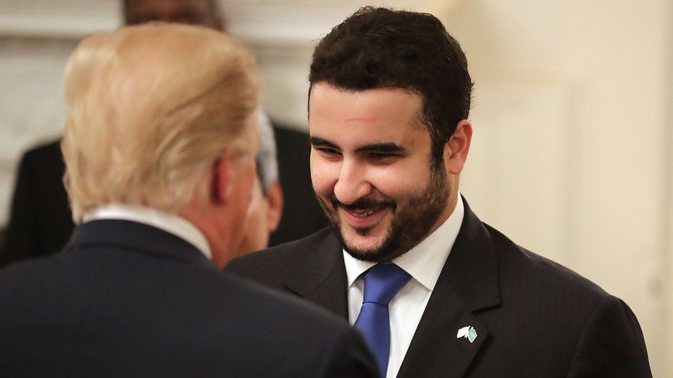 President Donald Trump (L) greets The Saudi Ambassador to the United States Prince Khalid bin Salman bin Abdulaziz during an Iftar dinner in the State Dining Room at the White House 6 June 2018 in Washington DC
