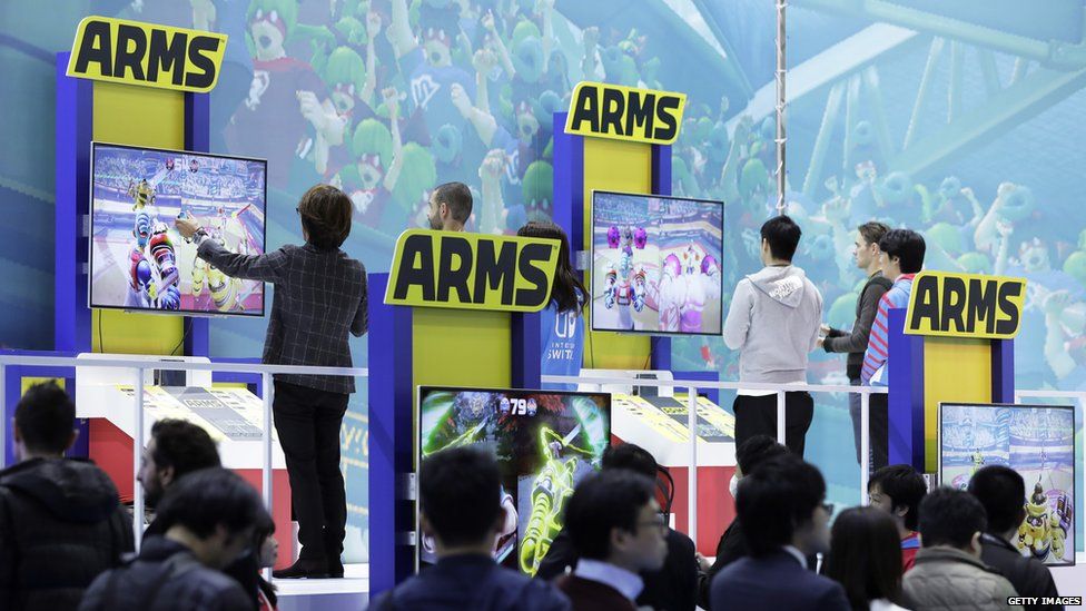 People have a go at Arms at the Switch's launch event in Japan