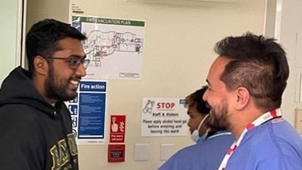 Atul Rao warmly greets a clinician