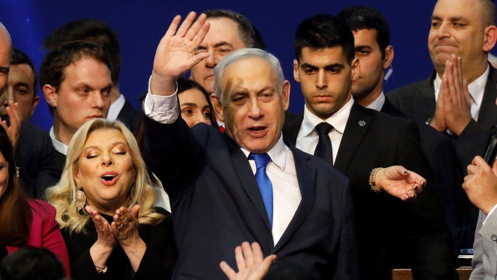 Benny Gantz waves to supporters at an election night gathering in Tel Aviv on 3 March 2020