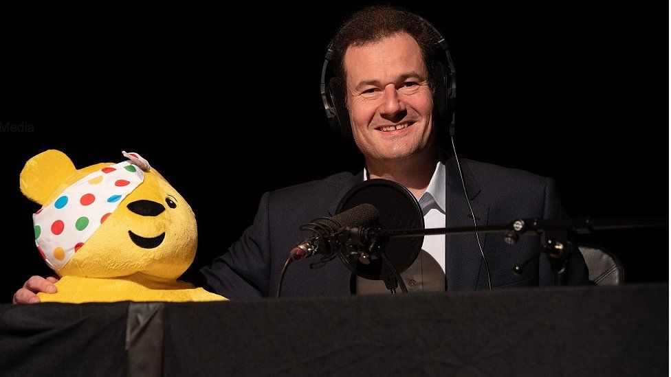 Roger Tilling, pictured with Pudsey Bear in 2021