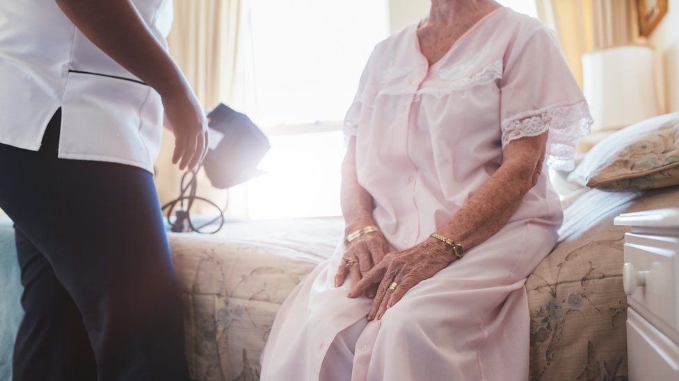 Woman with her carer