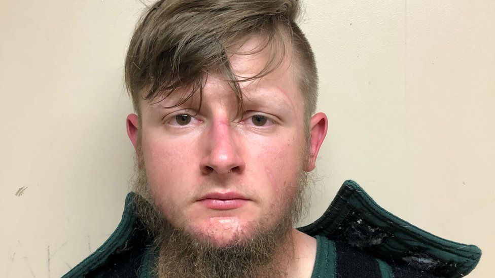 Robert Aaron Long, 21, of Woodstock in Cherokee County poses in a jail booking photograph after he was taken into custody by the Crisp County Sheriff"s Office in Cordele, Georgia, U.S. March 16, 2021.