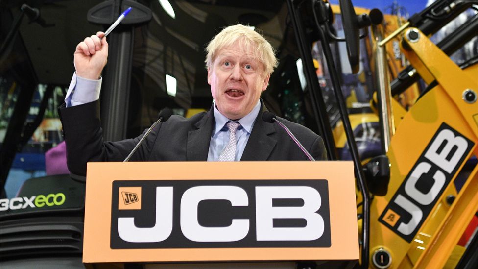 Boris Johnson giving a speech at JCB's headquarters