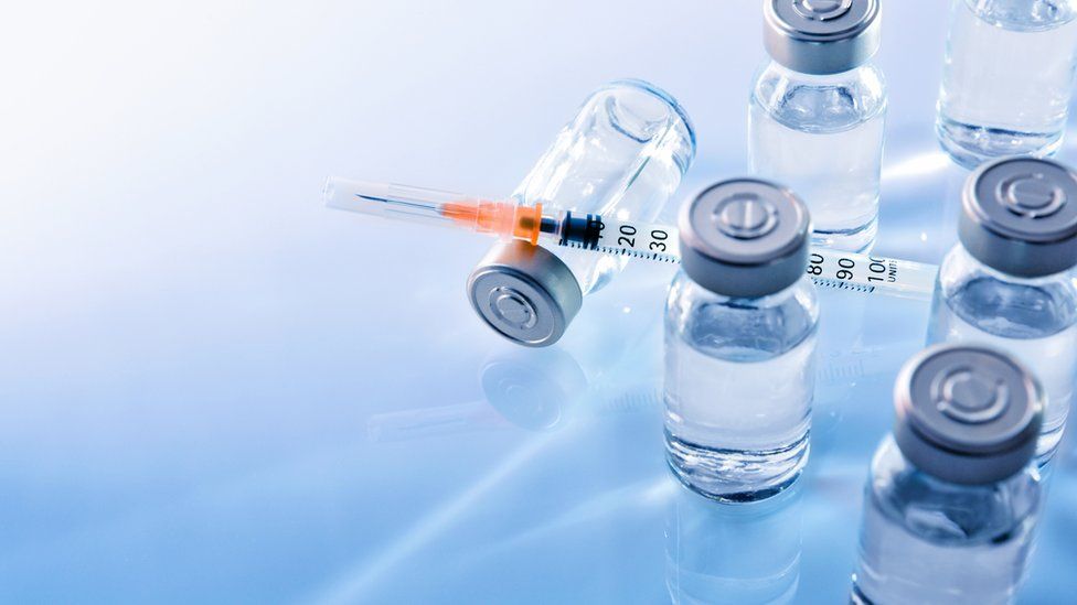 A needle and vaccines