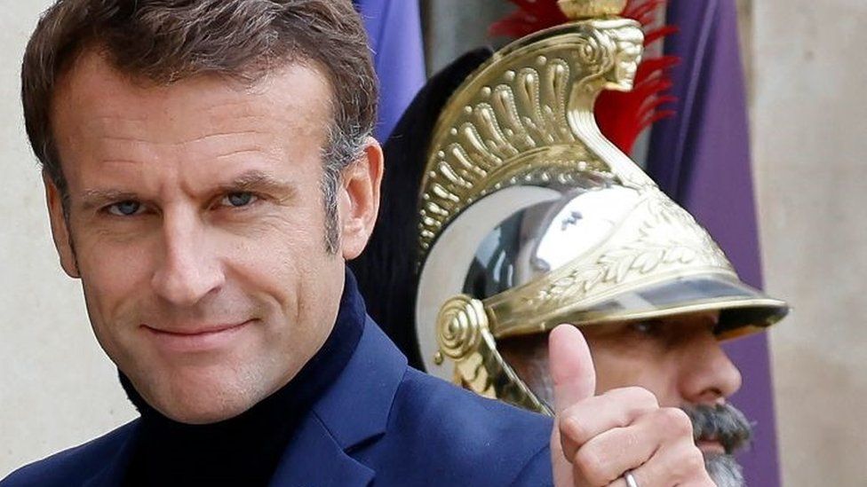 Macron wearing a turtleneck