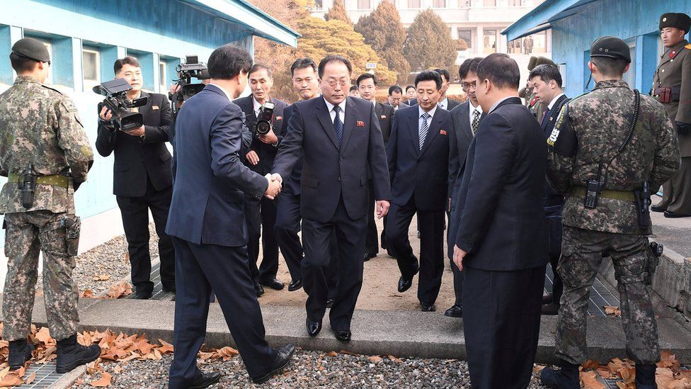 Head of the North Korean delegation Jon Jong-su, vice chairman of the Committee for the Peaceful Reunification of the Country (CPRC) of the DPRK, crosses the concrete border to attend his meeting with Southern counterparts at the truce village of Panmunjom in the demilitarised zone separating the two Koreas, South Korea, 17 January 2018