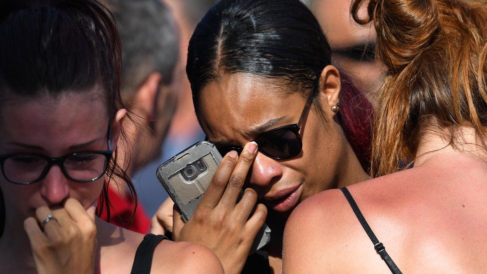Women mourn the dead in Nice