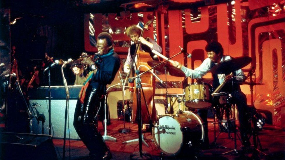 Miles Davis performs on stage with pianist Chick Corea, bassist Dave Holland and drummer Jack Dejohnette for the BBC Jazz Scene TV show, filmed at Ronnie Scott's Jazz Club in London in 1969