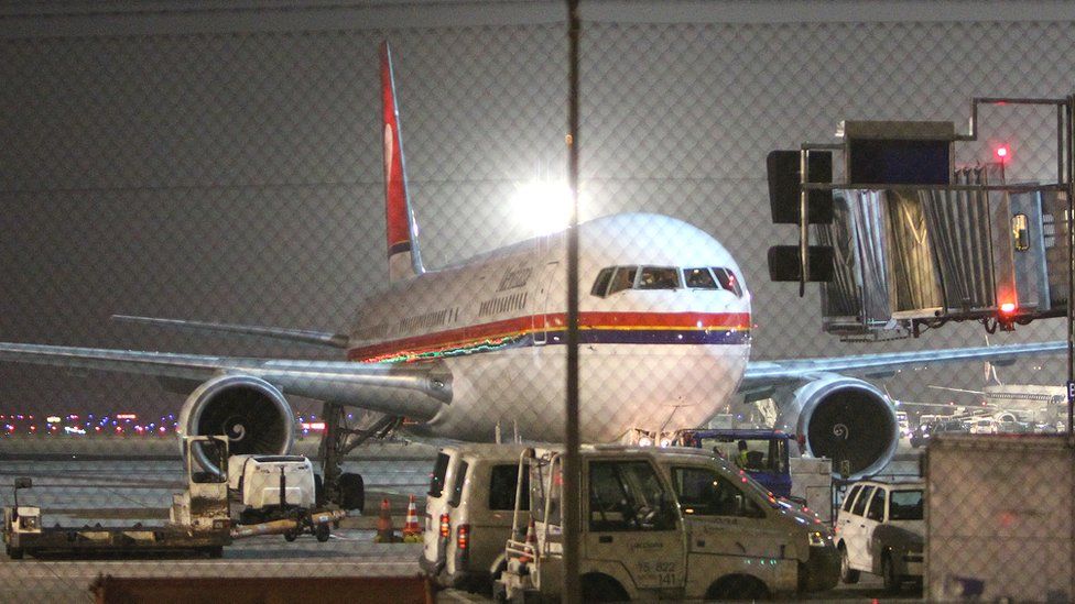 Plane on tarmac before deportation flight from Germany, file pic (Dec 2016)