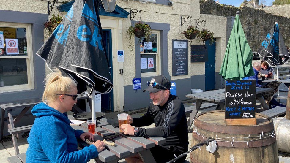 People enjoyed soaking up the sunshine as the Liverpool Arms reopened in Conwy