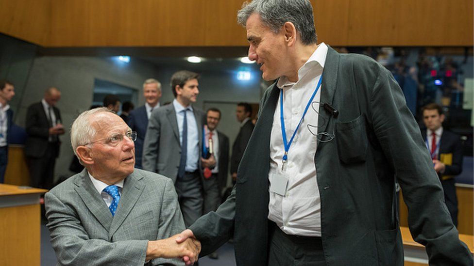 German Finance Minister Wolfgang Schaeuble (L) and Greece Finance Minister Euclid Tsakalotos (R)