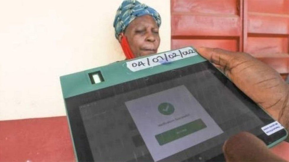 An election official holds the BVAS machine during the Anambra state governorship election