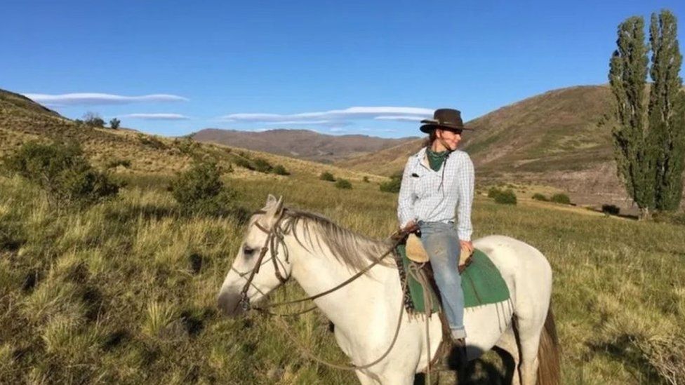 Annabel Symes poses on horseback