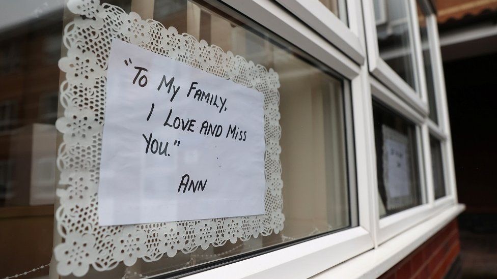 A message from a resident in the window of a care home