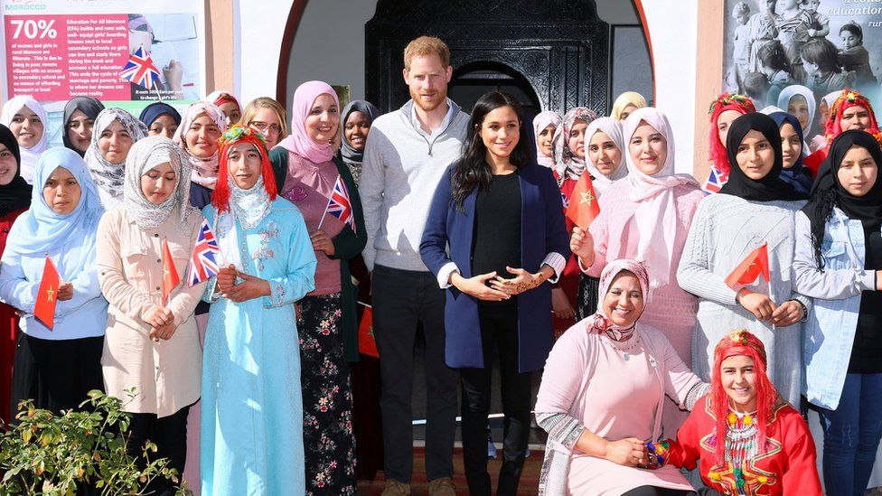 Prince Harry and Meghan pose with staff and girls as they visit a boarding house for girls run by the Moroccan NGO "Education for All" in Asni, Morocco