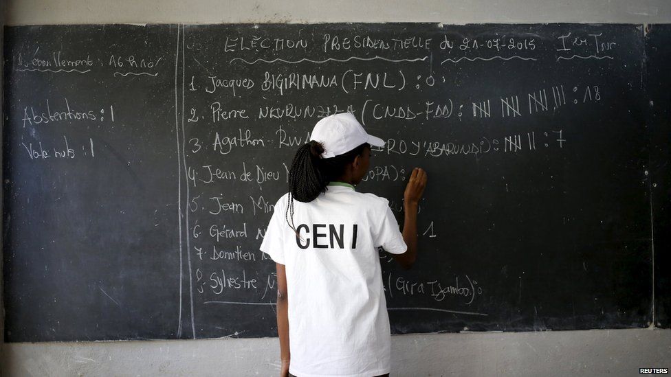 An election official tallies ballots during counting for Burundi's presidential elections in the capital Bujumbura, July 21, 2015.