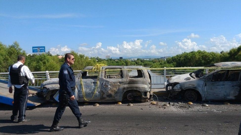 Burned out vehicles in Culiacan, Mexico, after clashes between police and the Sinaloa cartel, 18 October 2019